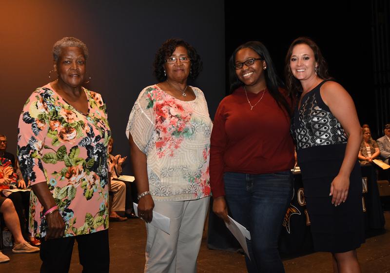 Shayla Brittigham, second from right, is shown with (l-r) Waynne Paskins of Sunshine Circle Club, Janie Miller of Dr. Martin Luther King Jr. Celebration Organization of Sussex County, and Cape Principal Nikki Miller. NICK ROTH PHOTOS